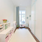 IKEA pink tubs with floral stickers