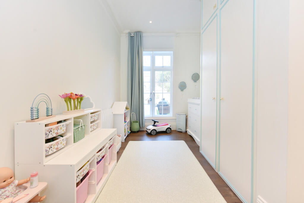 IKEA pink tubs with floral stickers
