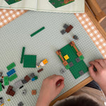 Travel base for building bricks